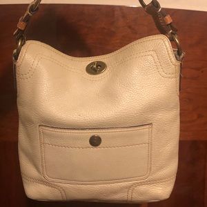Coach cream woman’s hand bag